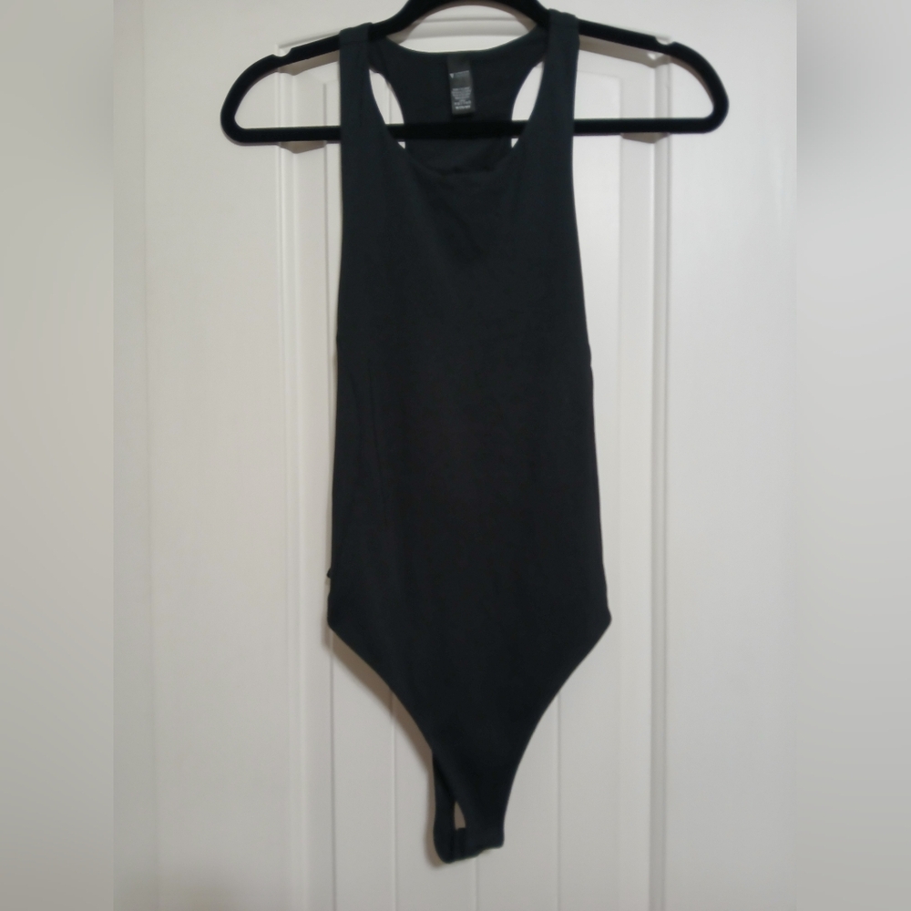 Victoria's secret sport bodysuit. New without tags Size Medium
